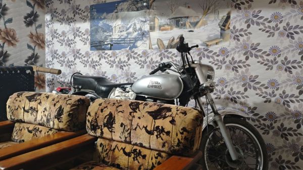 The home is dotted with remnants of Fauji’s former life: NSG insignia and trophies gathered over years of service. His Royal Enfield motorcycle is parked nearby.