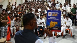 Between a steering wheel and a blackboard: How Mumbai's migrant drivers are learning Marathi, one shift at a time