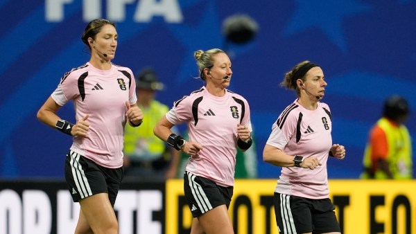 Referee Tori Penso (C), assistant referees Kathryn Nesbitt (L) and Brooke Mayo, warm up before the World Cup Group A soccer match between Czechia and South Africa in Atlanta. (AP)