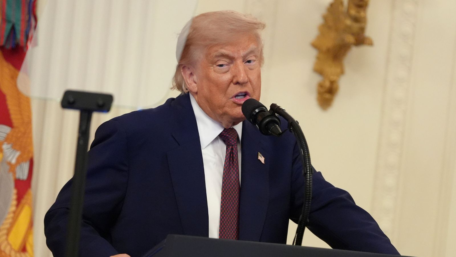 Trump signs Iran nuclear deal in hastily arranged Versailles ceremony