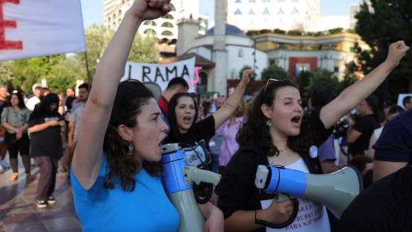 Protesters take part in a rally in Tirana, Albania, Tuesday, June 9, 2026, against the construction of a massive coastal development project linked to Jared Kushner and Ivanka Trump at Narta lagoon area, western Albania. (AP Photo/Hameraldi Agolli)