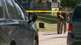 This image taken from video provided by WQAD, police investigate the fatal shootings of several people in Muscatine, Iowa. (Photo: AP)