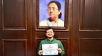 Ousted TMC leader Ritabrata Banerjee below the portrait of TMC chief and former West Bengal CM Mamata Banerjee in an old photo; Ritabrata leaves from Vidhan Sabha, in Kolkata on Wednesday. (Express Photo, ANI)