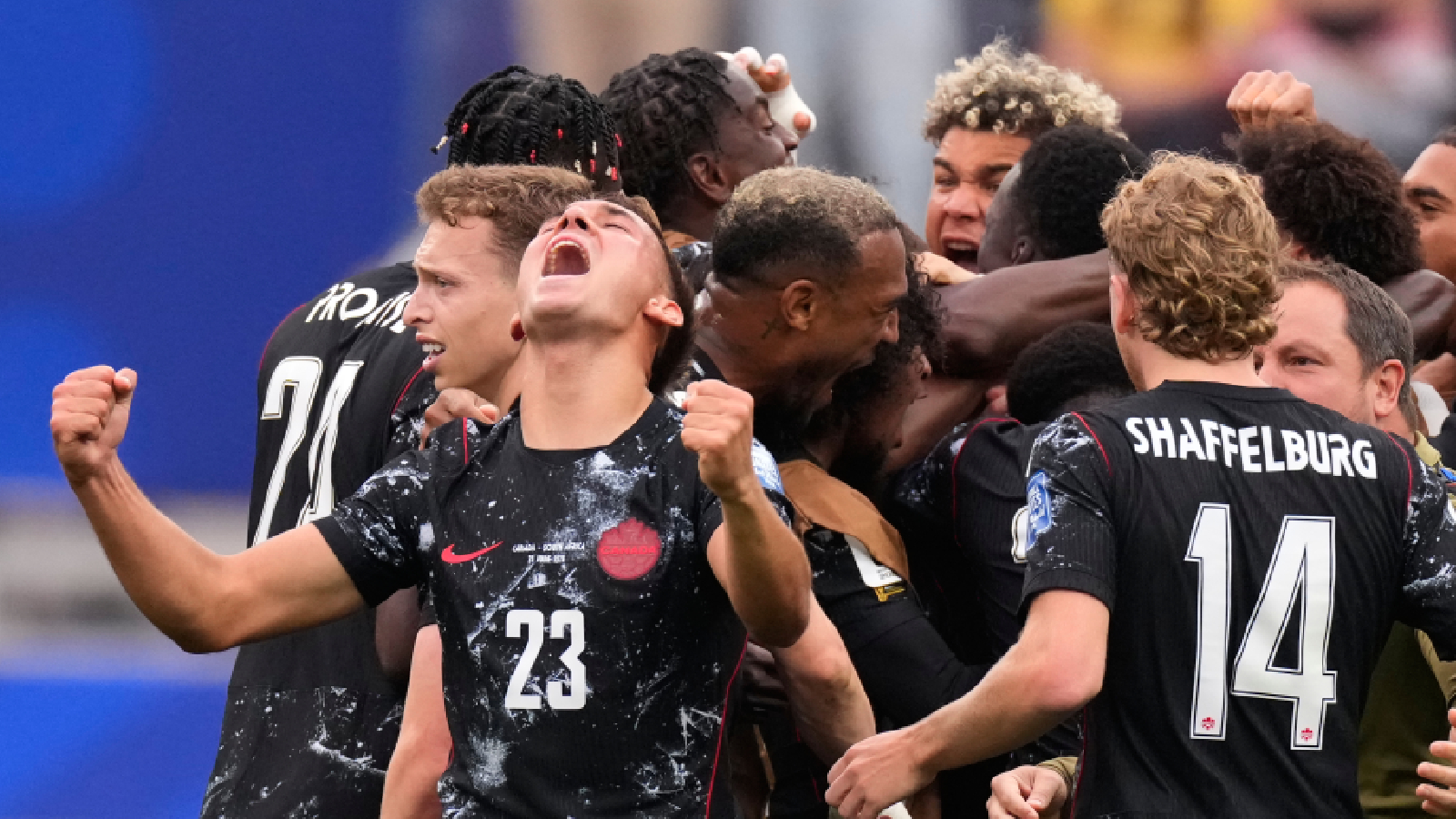 Players of Canada celebrate after Stephen Eustaquio scored the opening goal during a World Cup round of 32 football match between South Africa and Canada in Inglewood, near Los Angeles. (AP Photo)