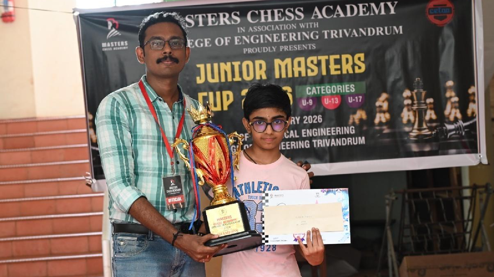 Divi Bijesh with her coach Sreejith GS, who trains her at Trivandrum’s Masters Chess Academy. (Photo by special arrangement)