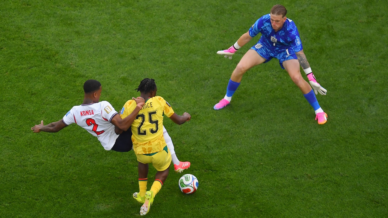 A challenge made by England defender Ezri Konsa on Prince Adu that led to loud appeals for penalty from the Ghanaians that fell on deaf ears. (AP Photo)