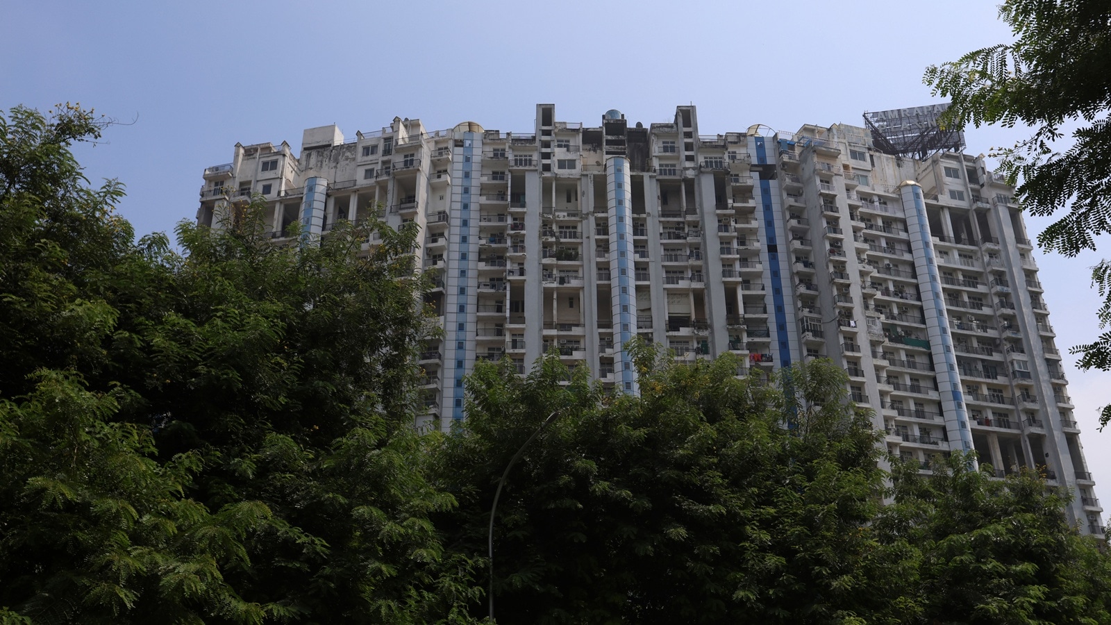 Greater Noida: Man dies as concrete plaster falls from 19th floor of high-rise | Delhi News