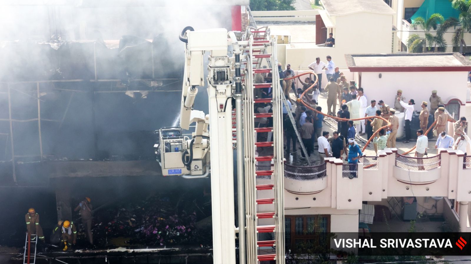 Lucknow fire: Rescue teams break wall to reach victims in Aliganj building