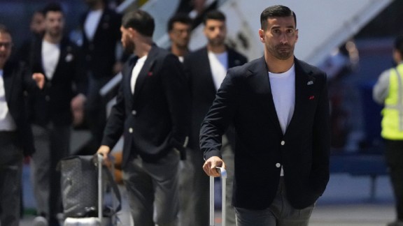 Iran's Ehsan Hajisafi, right, arrives with his teammates for the World Cup soccer tournament in Tijuana, Mexico, Sunday, June 7, 2026. (AP Photo/Gregory Bull)