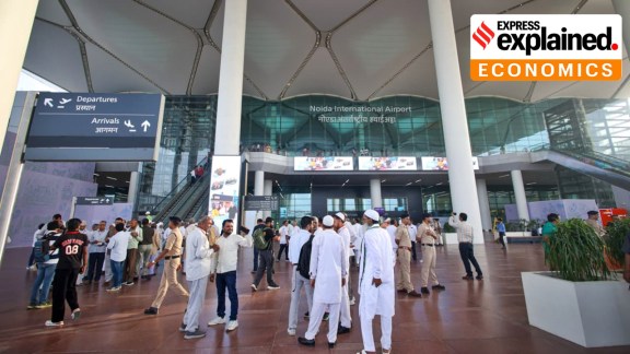 Travellers at the Noida International Airport, Jewar in Uttar Pradesh on Monday. The first flight had farmers who gave their land for the airport.