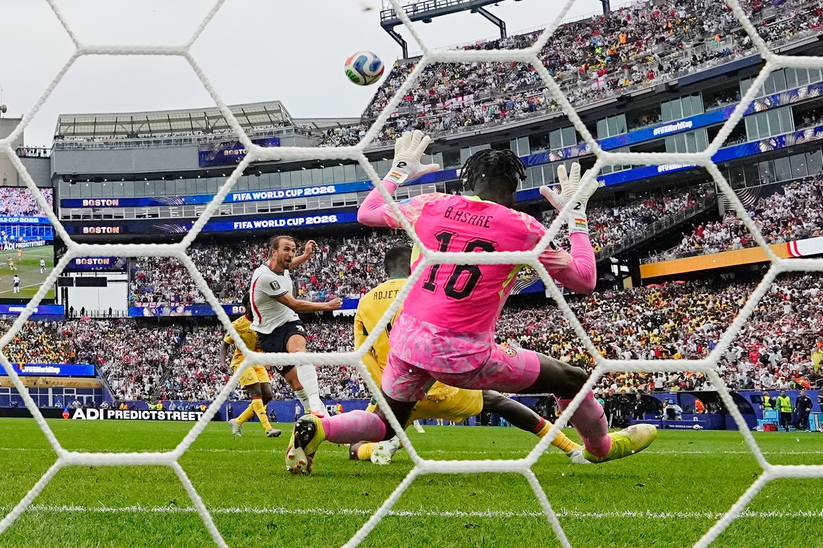 Kane blasts the ball over the bar during the World Cup Group L soccer match between England and Ghana. (AP Photo/Martin Meissner)