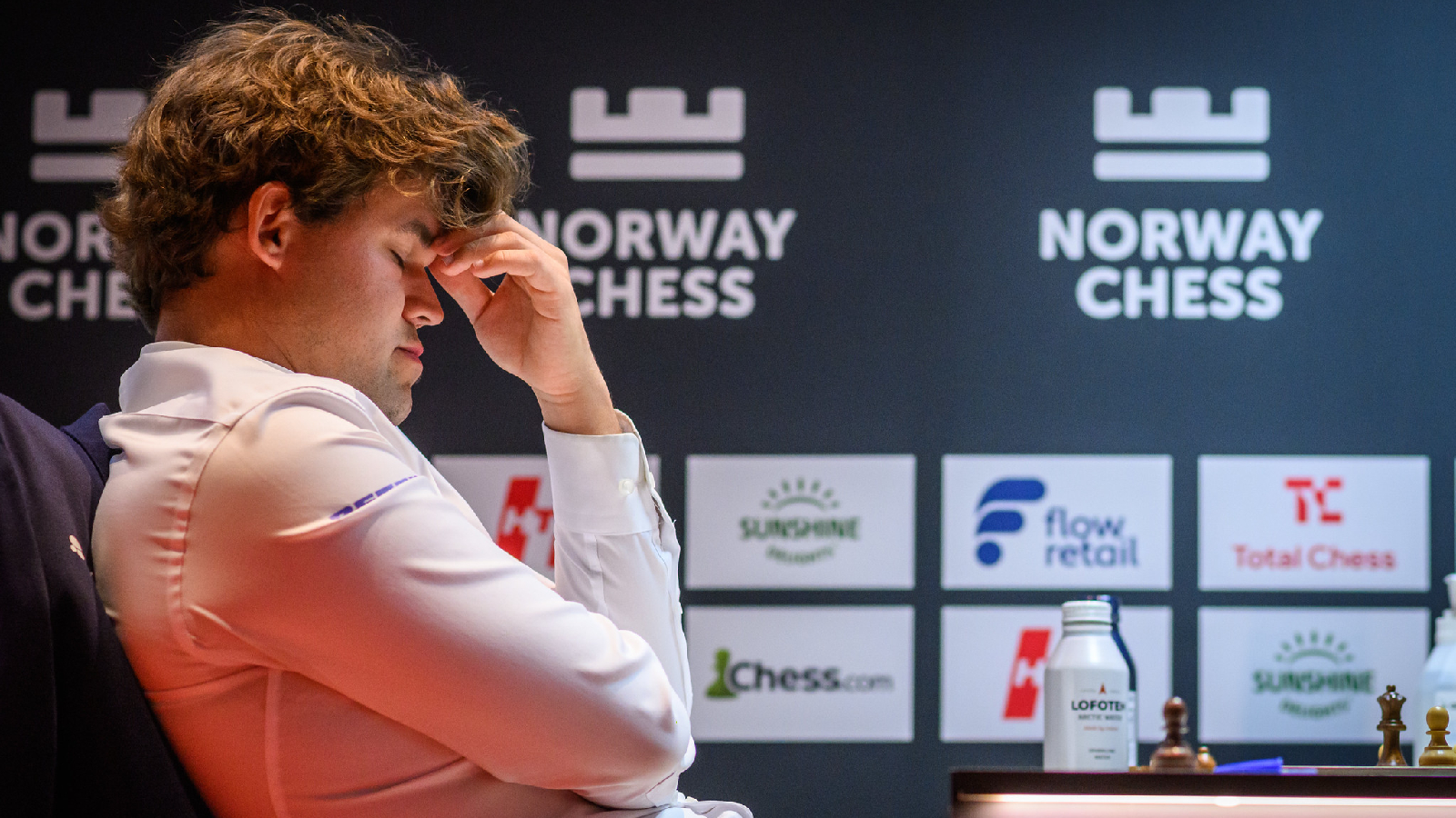 World No 1 Magnus Carlsen reacts during his round 8 game at Norway Chess against India's P Praggnanandhaa. (Photo: Michal Walusza / Norway Chess)