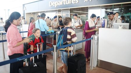 Passengers queue up at the departures terminal of Noida International Airport (PTI Photo)