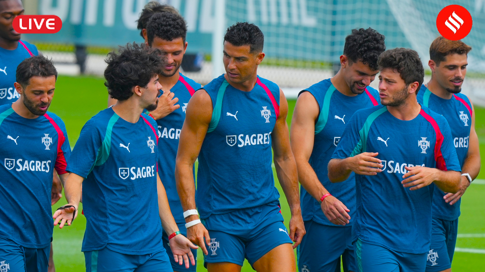 Portugal vs Colombia FIFA World Cup 2026 Match Live Score: Portugal's Vitinha gestures to Cristiano Ronaldo during the team's World Cup training session. (AP Photo)