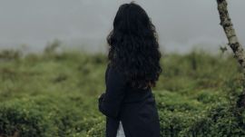 Midlife woman embracing independence and singlehood