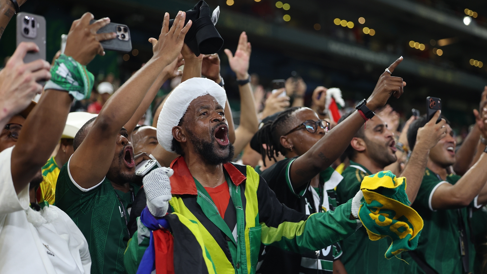 South African fans celebrate after their team's 1-0 win over South Korea in the World Cup Group A match. (AP Photo/Sofia Yaker)