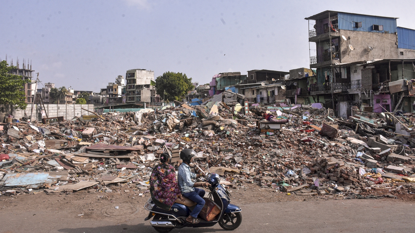 Gujarat High Court Demands Accountability for Surat Shanties Demolition