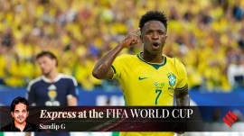 Brazil's Vinicius Junior celebrates after scoring his side's second goal during the World Cup Group C match against Scotland. (AP Photo)