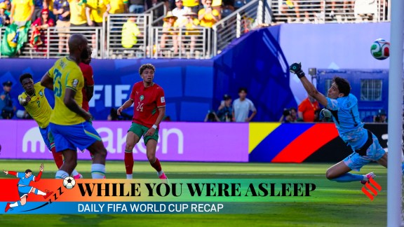 Morocco goalkeeper Yassine Bounou, right, fails to stop a shot from Brazil's Vinicius Junior who scores his side first goal during the World Cup Group C soccer match between Brazil and Morocco in East Rutherford, N.J., near New York, Saturday, June 13, 2026. (AP Photo)