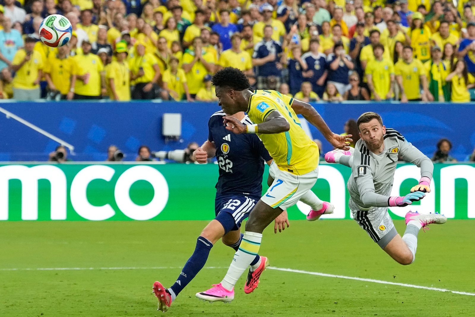 Vinicius Junior scores his team's second goal during the World Cup Group C match between Scotland and Brazil. (AP Photo)