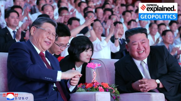 North Korean leader Kim Jong Un, right, and Chinese President Xi Jinping watch a welcome performance at Pyongyang Gymnasium on June 8. (Korean Central News Agency/Korea News Service via AP)