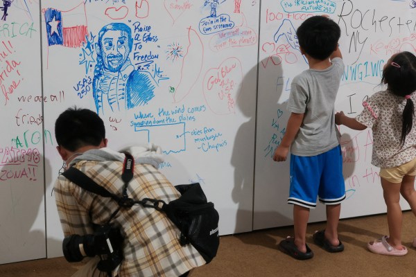 A quote from the musical Hamilton decorates a drawing wall in the National Endowment for the Arts display at the Great American State Fair celebrating the 250th anniversary of US independence in Washington, D.C., July 2, 2026. (REUTERS)