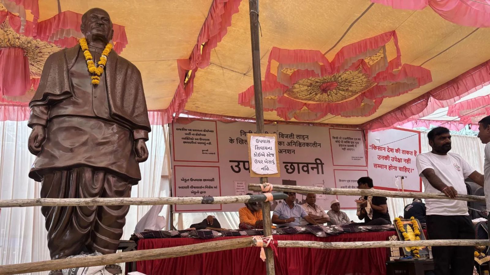 Gujarat farmers end fast but continue protest over Adani power project