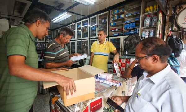 A routine morning at Denny Kakkar's shop Sagar Auto Agencies. (Express Photo by Praveen Khanna)