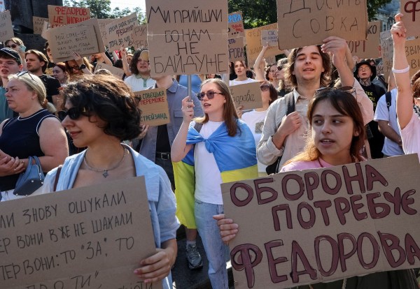 People protest against Ukrainian President Volodymyr Zelenskyy's decision to replace Mykhailo Fedorov as defence minister. (REUTERS)