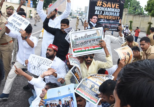 Samajwadi Party Youth wing workers hold a protest against state government on Mohammad Ali Jauhar University, demolition order, in front of state assembly in Lucknow on Monday. (Express Photo by Vishal Srivastav)