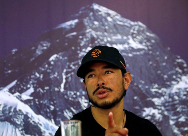 Nirmal Purja, attempting a record to climb fourteen 8000-meter mountain peaks in seven months speaks during a news conference after climbing six mountains including Mt. Everest in Kathmandu, Nepal May 28, 2019. (REUTERS)