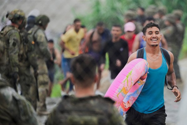 A migrant from Morocco reacts as he arrives at the Spanish border, in Ceuta, July 31, 2026, (REUTERS)
