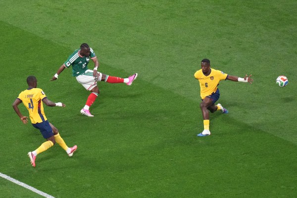 Mexico's Julian Quinones (16) scores their first goal against Ecuador'in Mexico City. (AP Photo/Silvia Izquierdo)