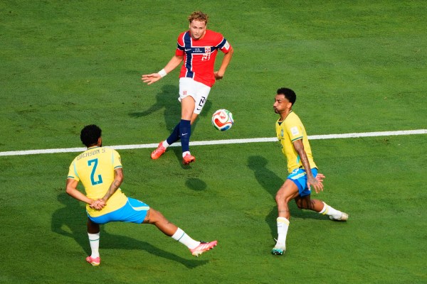 Norway's Andreas Schjelderup plays a cross that teammate Erling Haaland  headed in for his first goal during the World Cup round of 16 match against Brazil. (AP Photo/Yuki Iwamura)