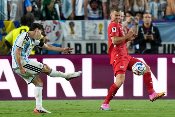 Argentina's Julian Alvarez (9) scores his team's second goal during the World Cup quarterfinal match against Switzerland in Kansas City. (AP Photo/Ashley Landis)