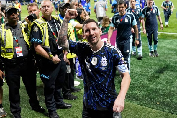 Messi (10) reacts as he leaves the ground after Argentina'swin in the World Cup semifinal against England. (AP Photo/Jacob Kupferman)