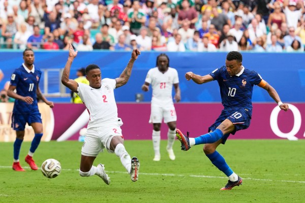 France's Kylian Mbappe (10) scores his side's third goal as during the World Cup third-place playoff match. (AP Photo/Rebecca Blackwell)