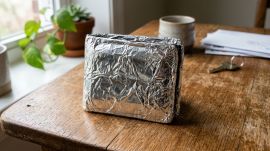 Wallet wrapped in aluminium foil blocking RFID signals