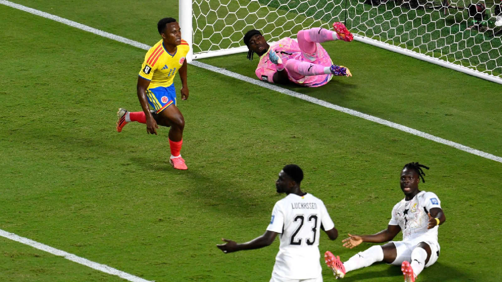 Colombia's Jhon Arias (11) celebrates after scoring their first goal during the World Cup round of 32 soccer match between Colombia and Ghana in Kansas City, Mo., Friday, July 3, 2026. (AP Photo/Reed Hoffmann)
