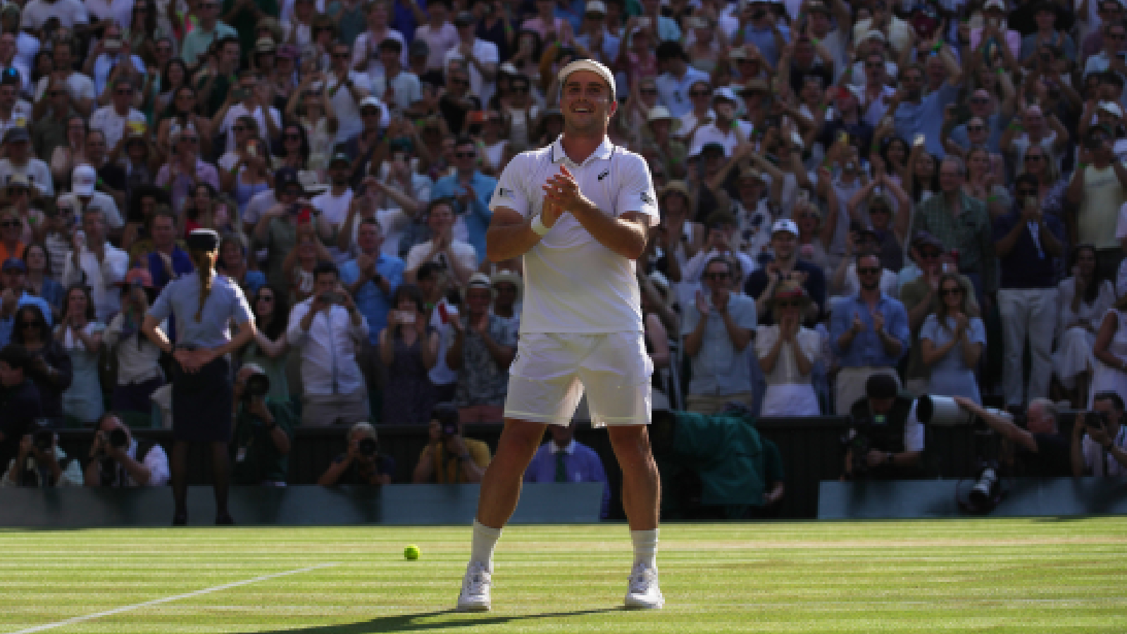 Arthur Fery of Britain reacts to winning against Flavio Cobolli of Italy in their quarter-final men's singles match at the Wimbledon Tennis Championships in London, Wednesday, July 8, 2026. (AP Photo/Brian Inganga)