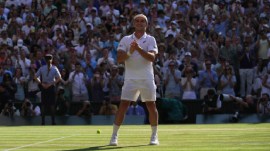 Arthur Fery of Britain reacts to winning against Flavio Cobolli of Italy in their quarter-final men's singles match at the Wimbledon Tennis Championships in London, Wednesday, July 8, 2026. (AP Photo/Brian Inganga)