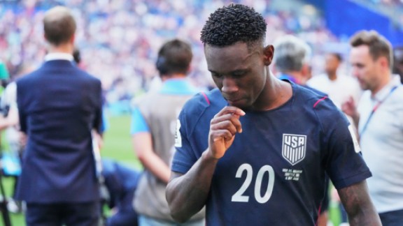 United States' Folarin Balogun (20) walks off the pitch after losing to Belgium in their World Cup round of 16 soccer match in Seattle, Monday, July 6, 2026. (AP Photo/Ted S. Warren)