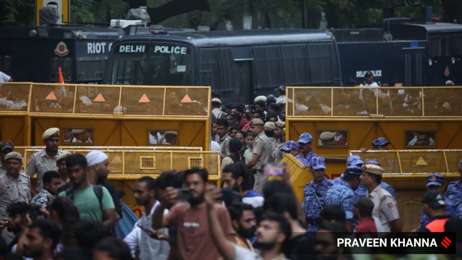 Cockroach Janata Party (CJP) supporters gather during a protest march. (Express Photo by Praveen Khanna)