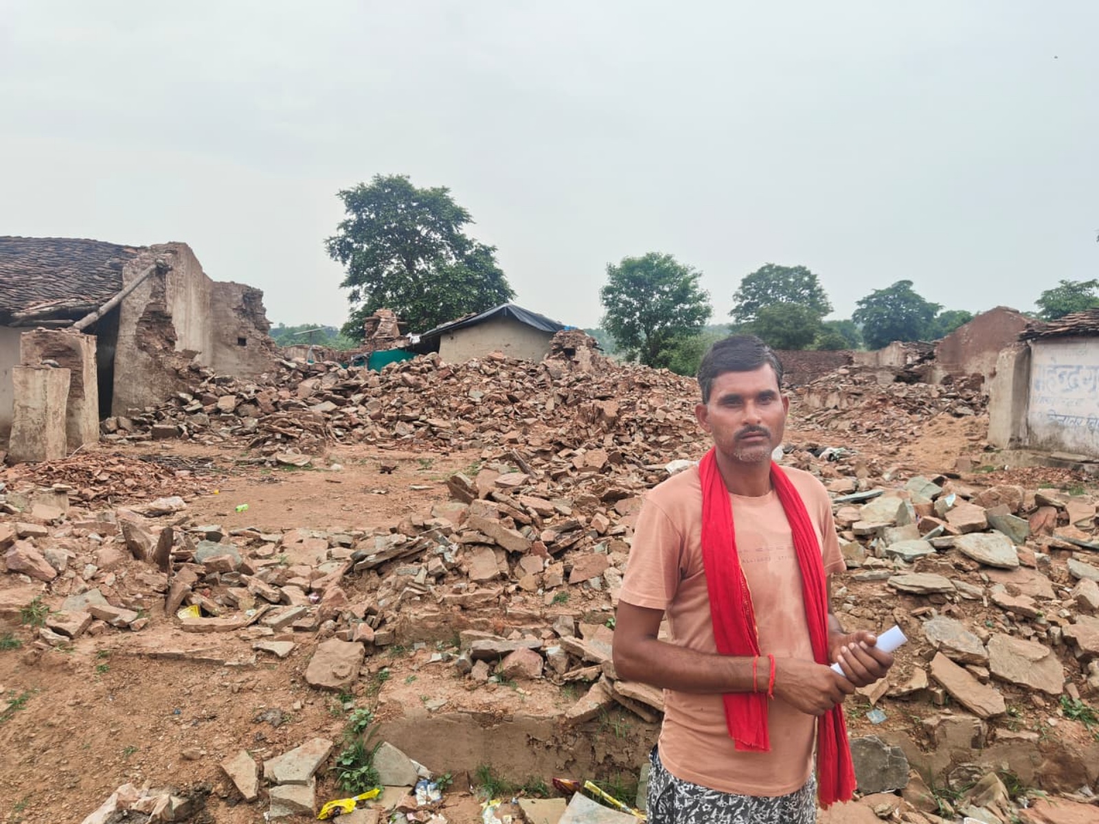 man before ruins, DAUDHAN VILLAGE
