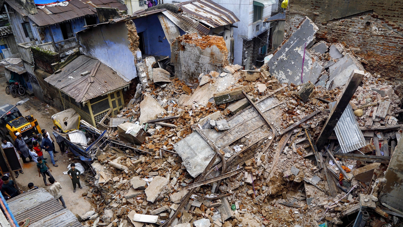 Woman killed in Ahmedabad house collapse; son rescued