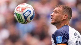 Bosnia's Edin Dzeko jumps for the ball during the World Cup Group B soccer match against Switzerland in Inglewood, Calif., near Los Angeles, Thursday, June 18, 2026. (AP Photo/Mark J. Terrill)