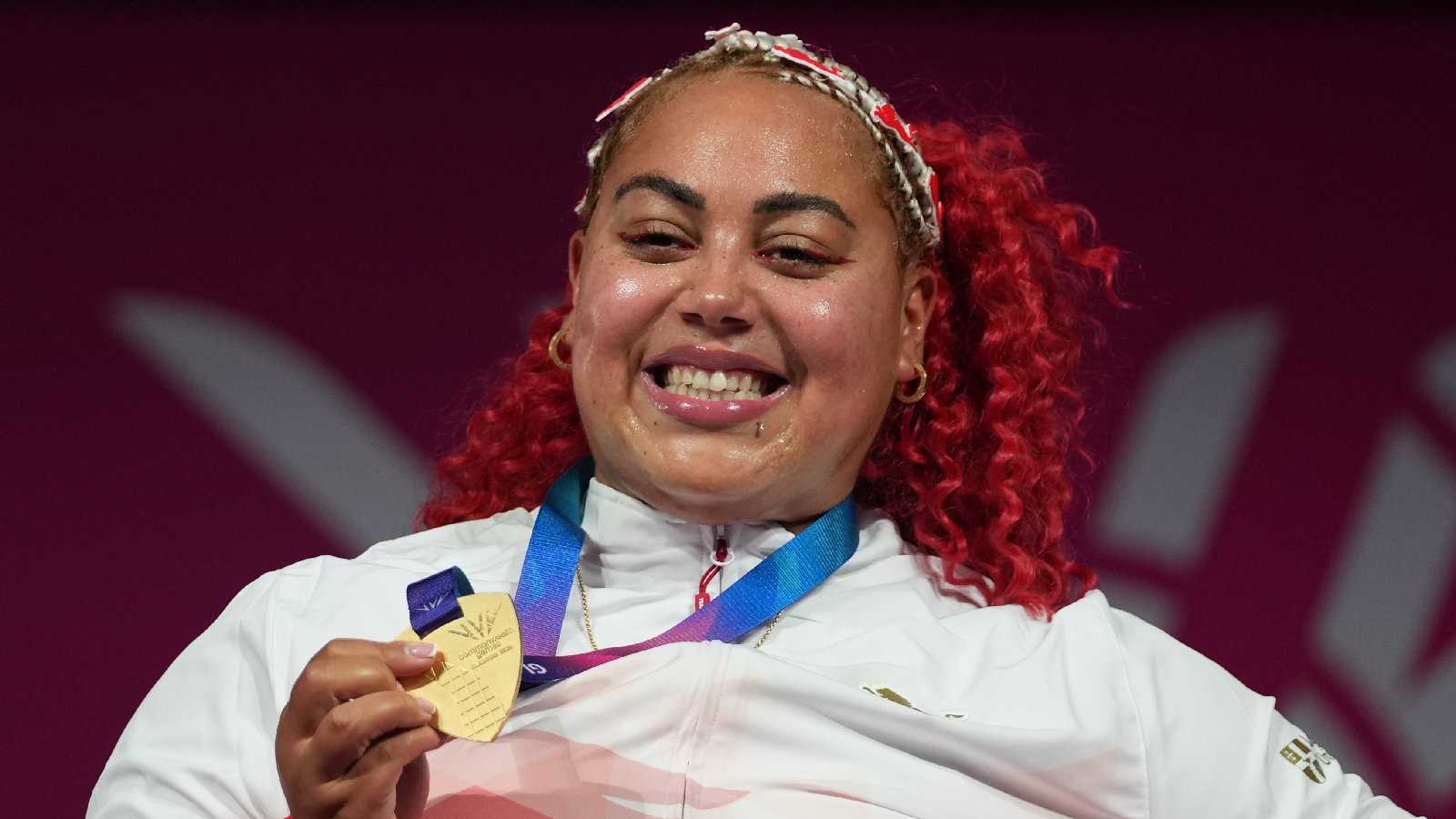 England's Emily Campbell celebrates winning the gold medal in the women's +86kg Weightlifting Final at the Commonwealth Games in Glasgow, Scotland, Thursday, July 30, 2026. (AP Photo/Eranga Jayawardena)