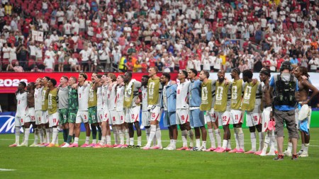 England players celebrate after the World Cup round of 32 match vs Congo. (AP)