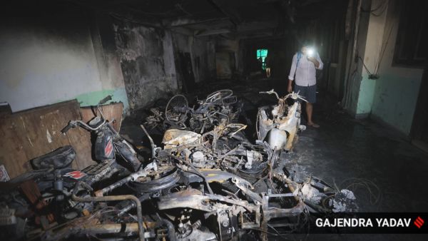 A residential building in Noida's Mamura village where a fire, suspected to have been triggered by a spark from an electric vehicle (EV) battery being charged, claimed two lives