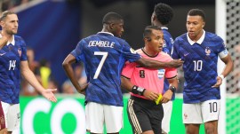 Spain vs France | Ousmane Dembele (7) and Kylian Mbappe (10) argue with referee Ivan Arcides Barton Cisneros after Adrien Rabiot (14) received a yellow card. (AP)